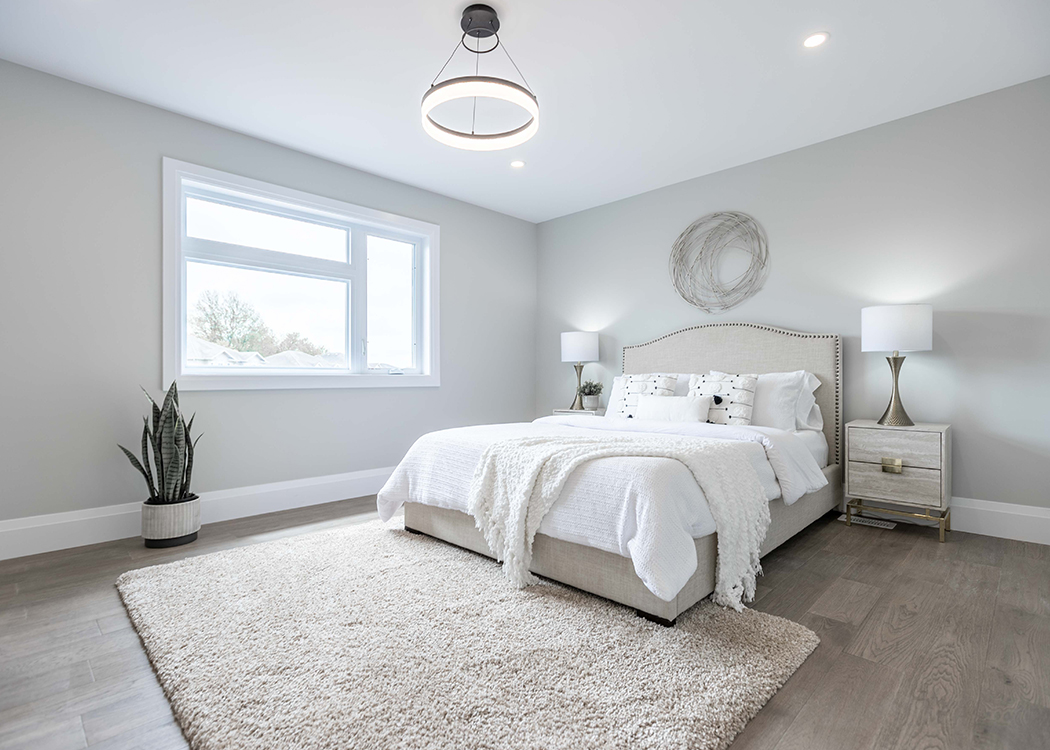 Luxury Bedroom Staging | Kitchener Waterloo & Goderich Elegant bedroom staging in Kitchener with soft lighting and luxurious bedding.